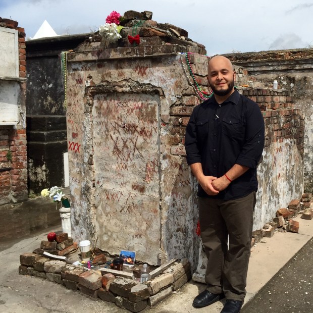 Aside from the XXX markings, this tomb is unmarked. Our tour guide assures us this is where Laveau is actually buried. The XXX markings are left by practitioners and devotees, they are petitions to Laveau. At the foot of the tomb we see various offerings and artifacts.