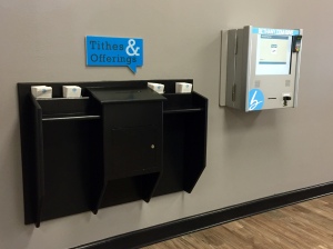 Old world and new world tithing! Automated Tithing Machine on the right.